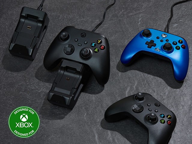Xbox controllers and Charging Station on a dark background