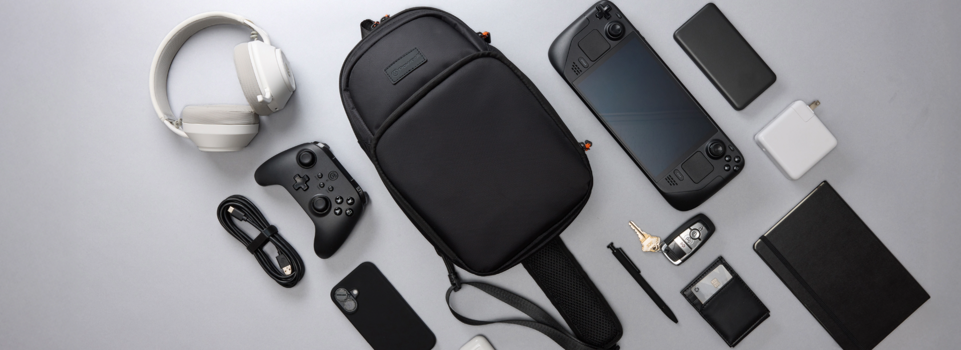 Galactic Vortex controller with glowing rgb galaxies on starry background