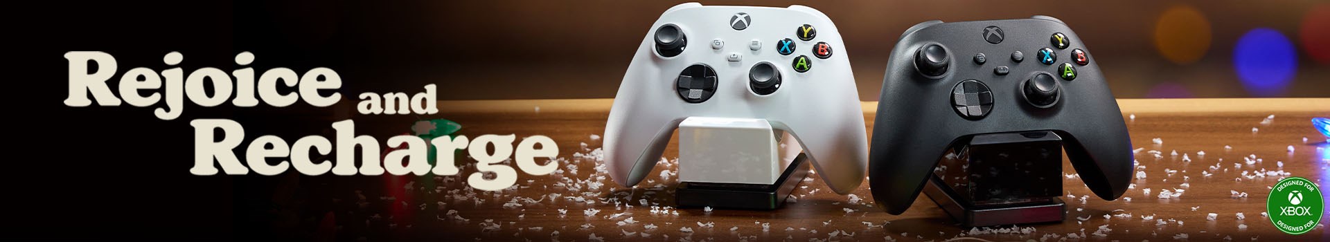 Rejoice and Recharge - Chargers for Xbox on a snowy table