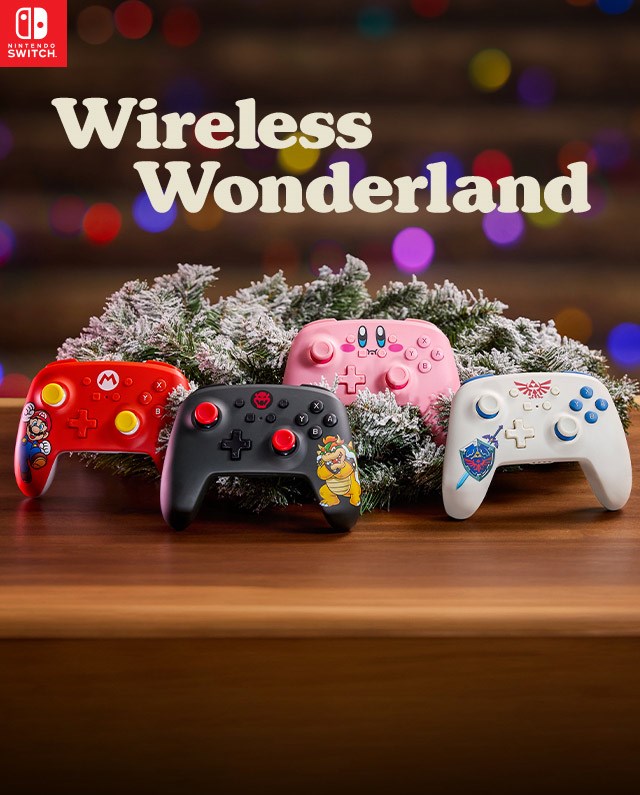 Controllers featuring your favorite Nintendo characters leaning on some snowy fir branches